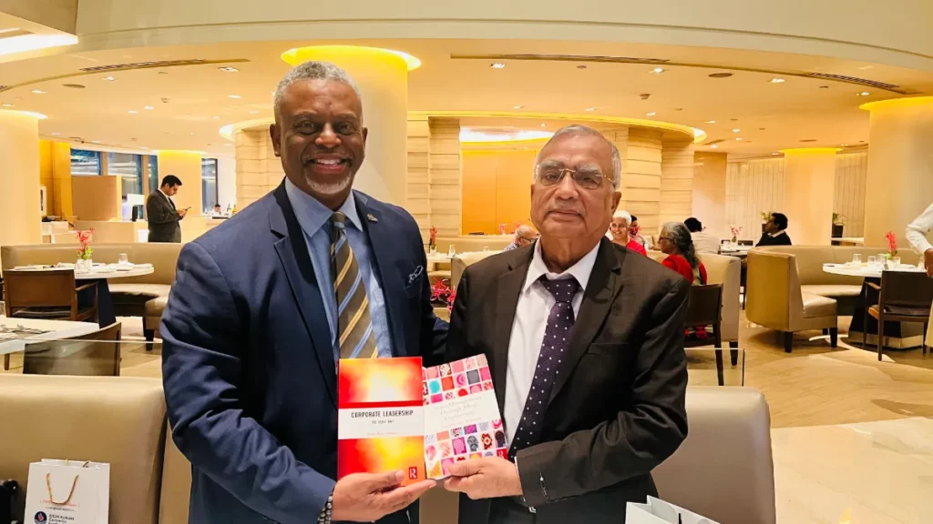 Presenting the books “Corporate Leadership-The Vedic Way” and “Stress Management through Mind Engineering” to Dr. Anthony Munroe, President of BMCC, CUNY, USA, at Mumbai, India
