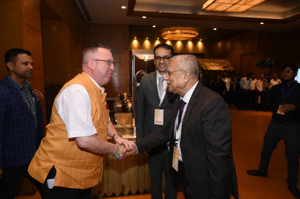 Greeting Dr. Andrew Fleming, British Deputy High Commissioner, East and Northeast India during the grand launch of the official website of Prof. (Dr.) R.P. Banerjee