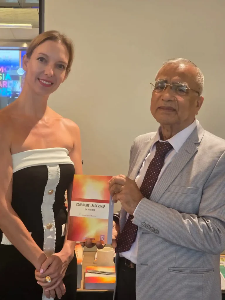 Presenting the Book " Corporate Leadership - the Vedic Way" to Ms. Eveliene Witjes, Head of HR, Tindle