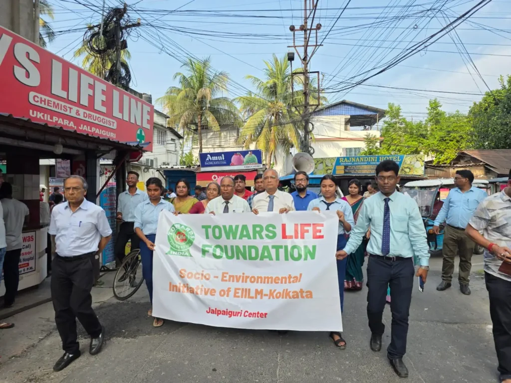 A united march in the presence of Prof. (Dr.) Dipak Kumar Roy, Hon'ble Vice Chancellor, Raiganj University and the students and teachers of EIILM -Kolkata, on the occasion of inauguration of the Jalpaiguri centre of Towards Life Foundation